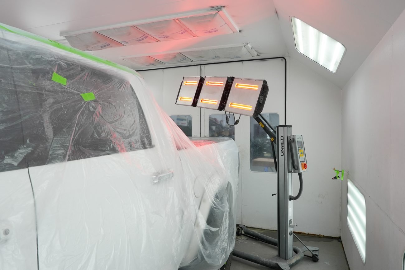 Car in the paint booth at Guttenberg Auto Body