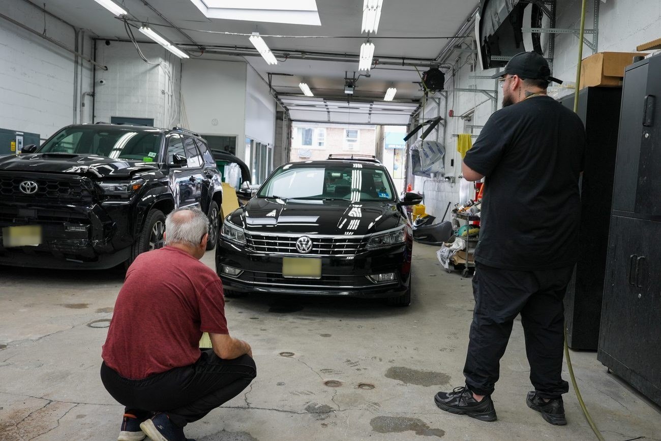 Collision repair underway in the bay at Guttenberg Auto Body
