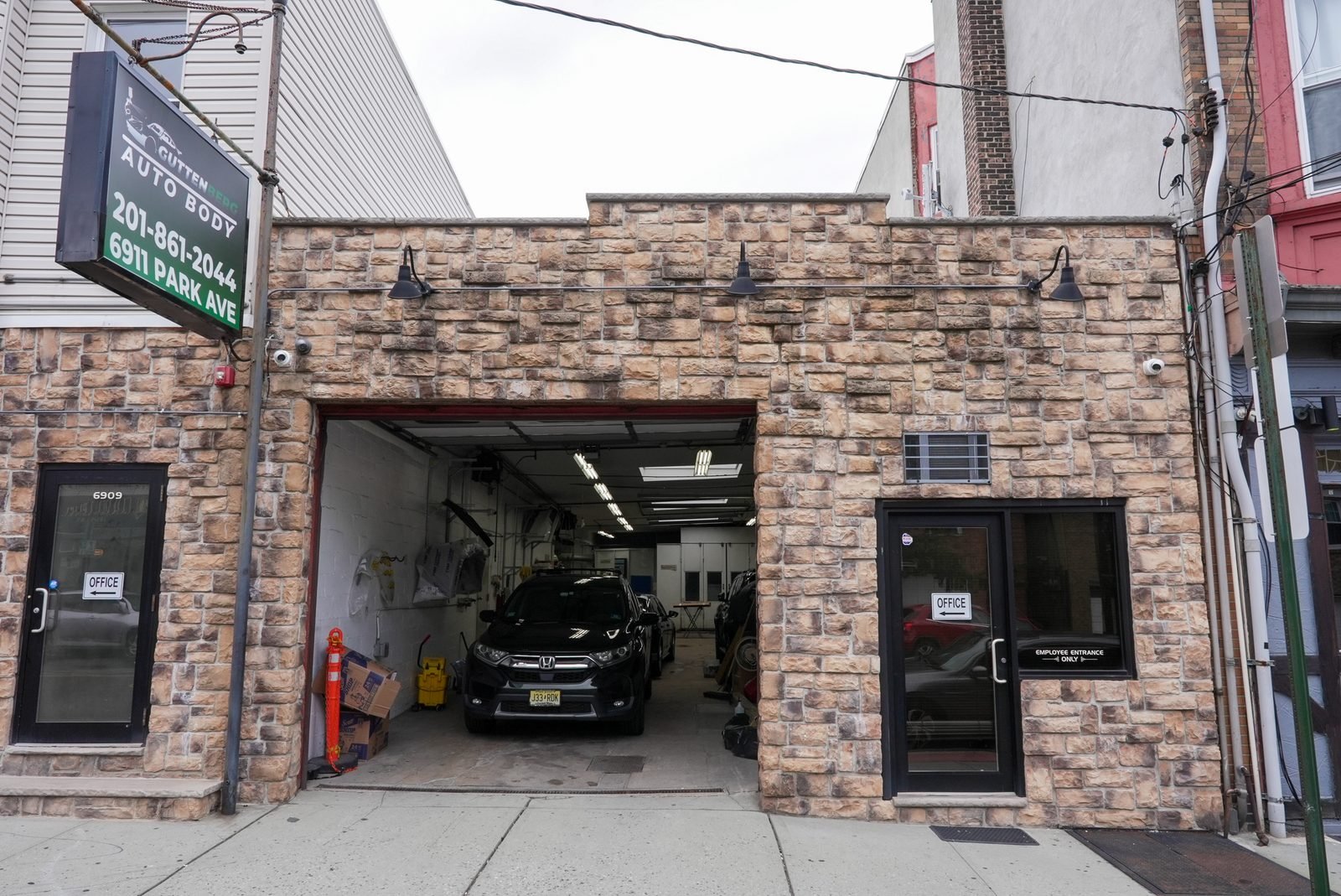 Guttenberg Auto Body storefront on Park Avenue