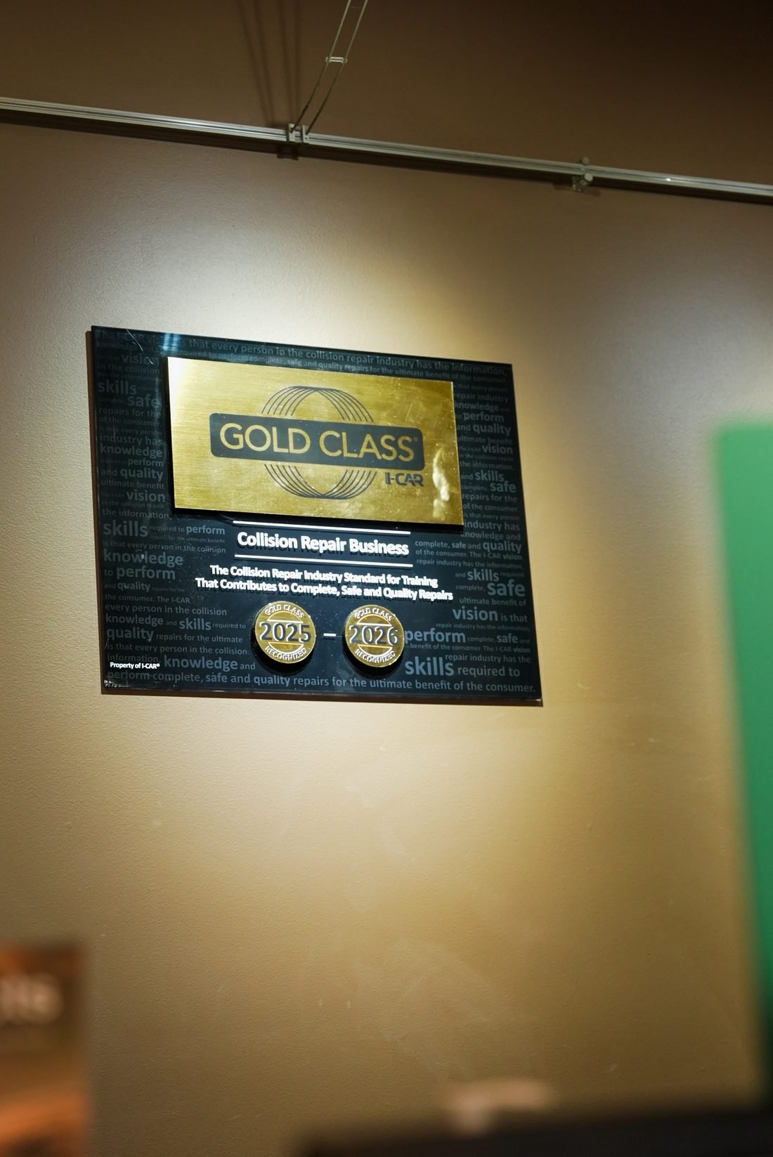 I-CAR Gold Class certificate on the wall at Guttenberg Auto Body