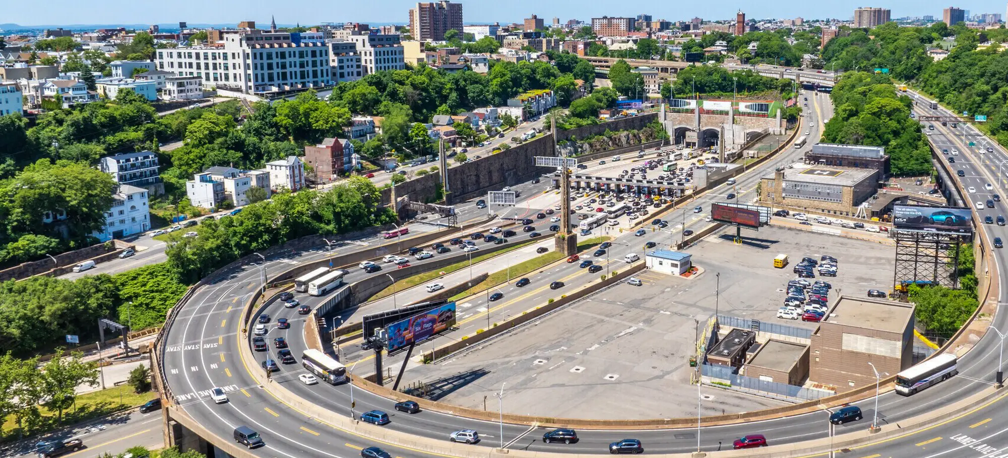 The Lincoln Tunnel helix and toll plaza in Weehawken, New Jersey, with traffic queuing for the tunnel portals